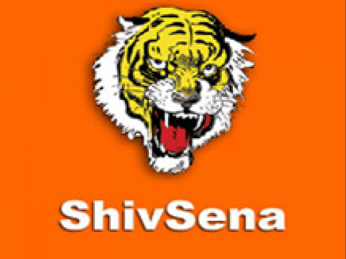 Bhagwat Karad's induction in Cabinet aimed at ending Pankaja Munde's  political career, alleges Shiv Sena - The Economic Times